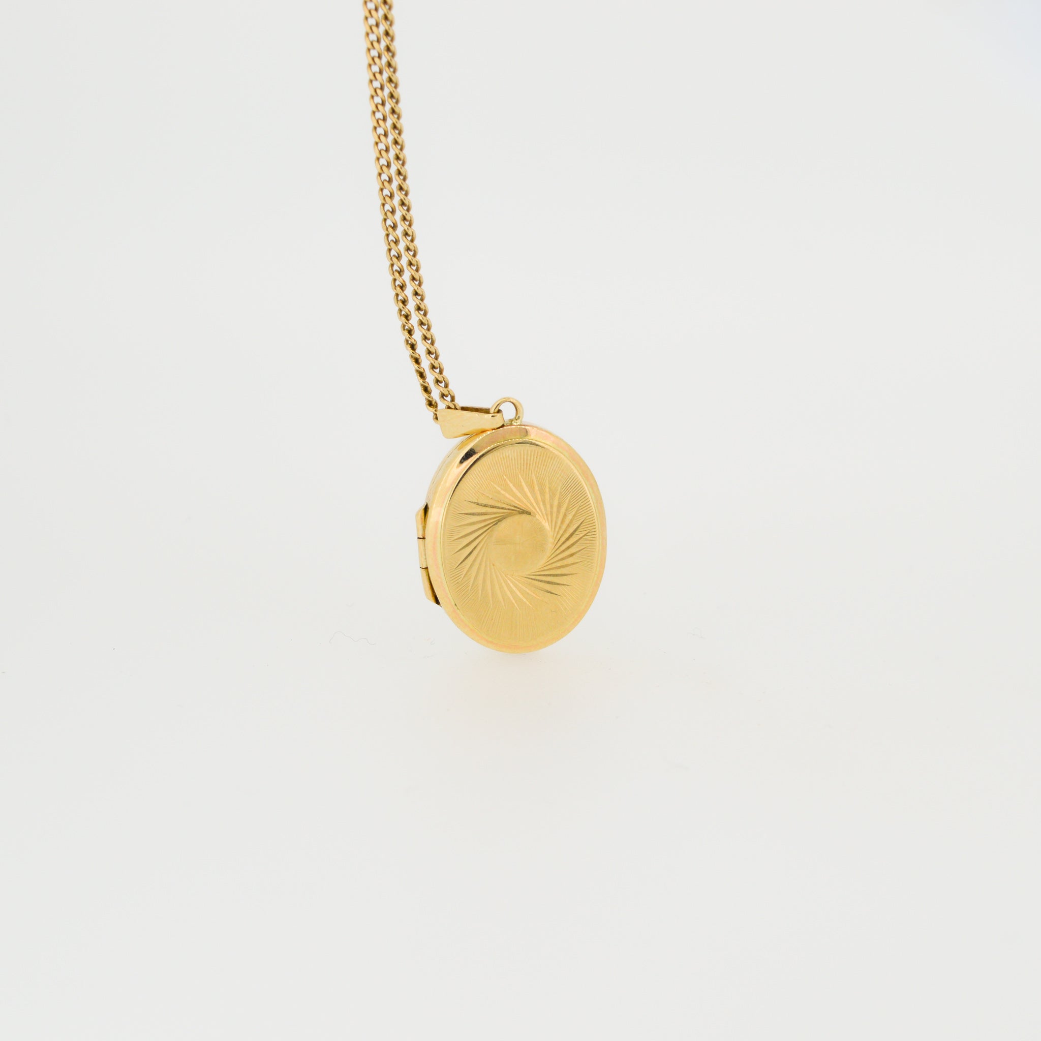 Patterned Oval Gold Locket Necklace
